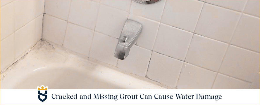 Bathtub With Cracked and Missing Grout in the Shower Joints Which Can Lead to Water Damage