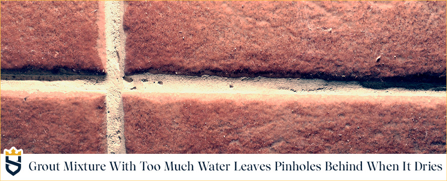 Closeup of Shower Grout Mixture With Too Much Water That Dried Leaving Pinholes Behind