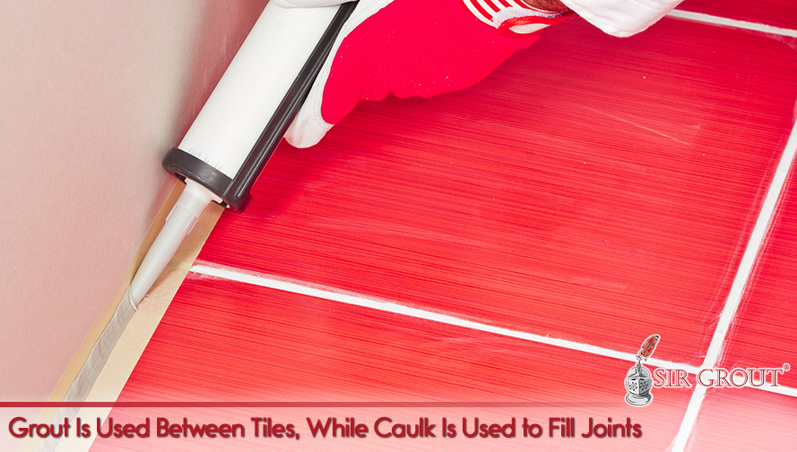 Picture of a Red Tile Floor with White Grout Lines and Caulking