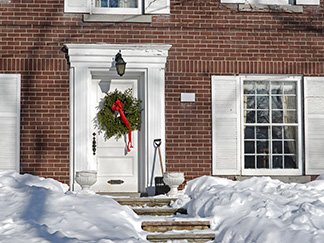 House entry covered with snow