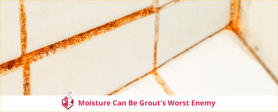 Closeup of Orange Stained Shower Grout That Discolored Due to Moisture Which Is Grout's Worst Enemy