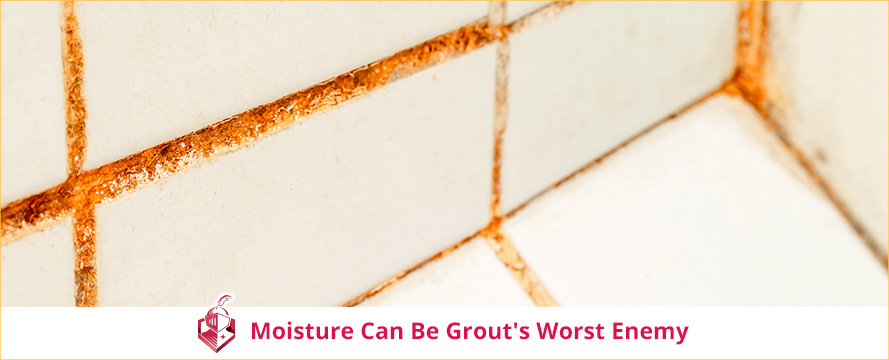 Closeup of Orange Stained Shower Grout That Discolored Due to Moisture Which Is Grout