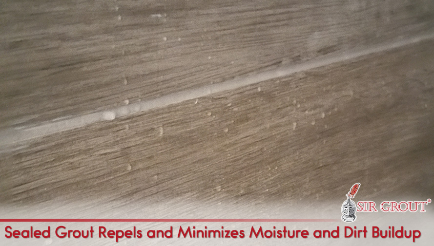 Closeup of Water Beads on Sealed Grout Which Repels and Minimizes Moisture and Dirt Buildup