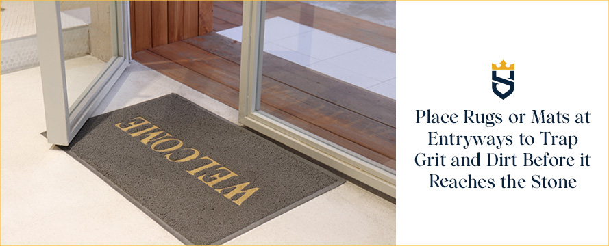 Place Rugs or Mats at Entryways to Trap Grit and Dirt Before it Reaches the Stone